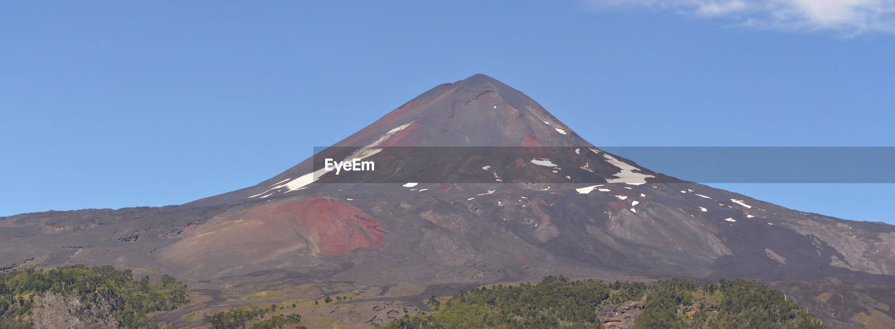 HIGH ANGLE VIEW OF VOLCANIC MOUNTAIN