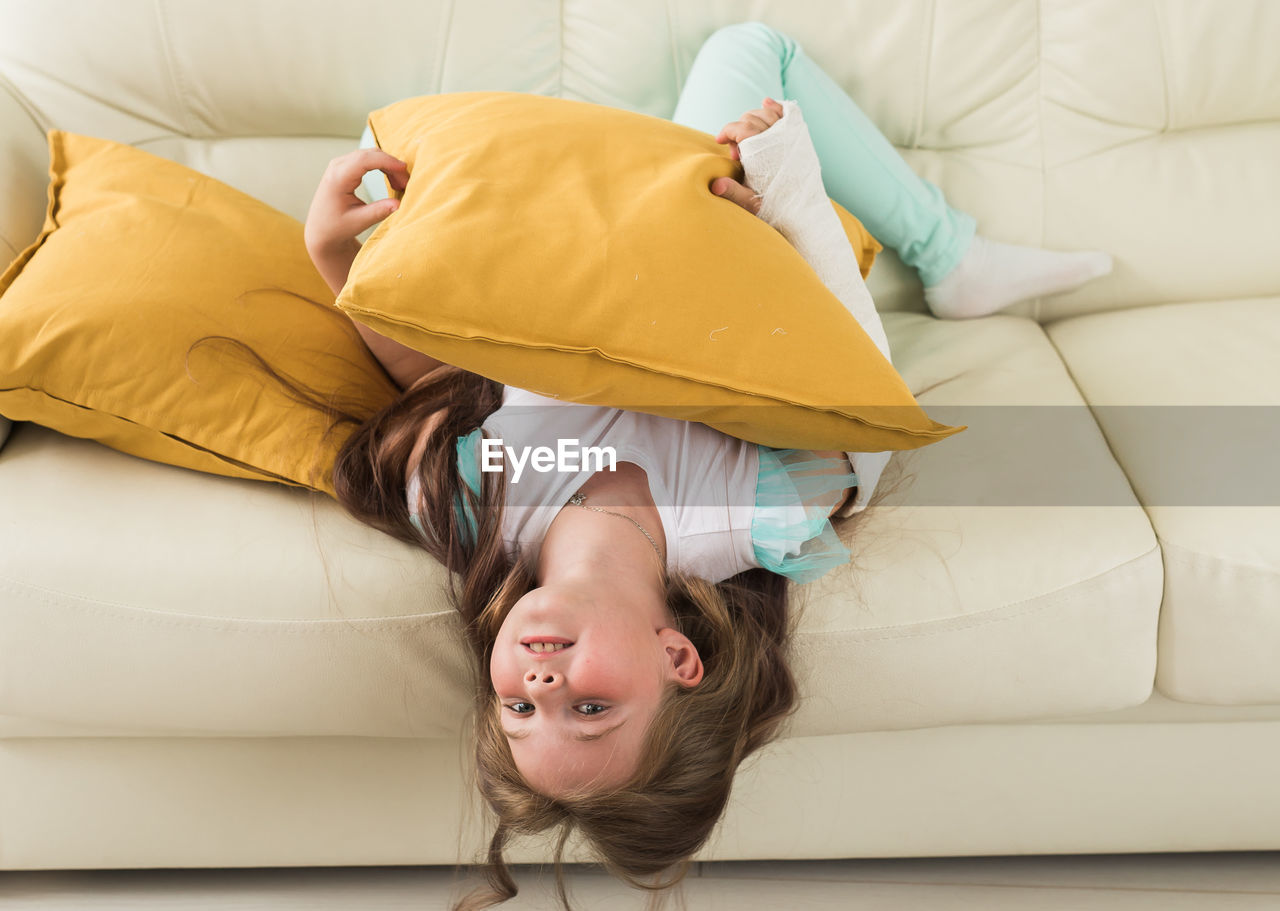 portrait of boy sleeping on bed