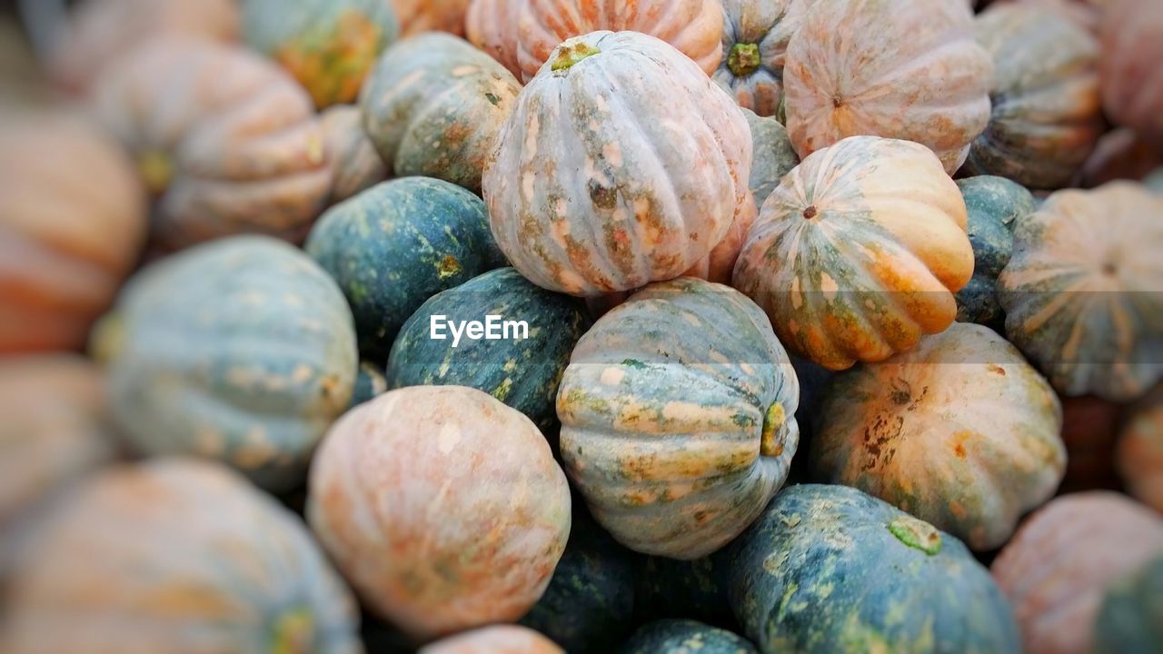 Full frame shot of pumpkins at market