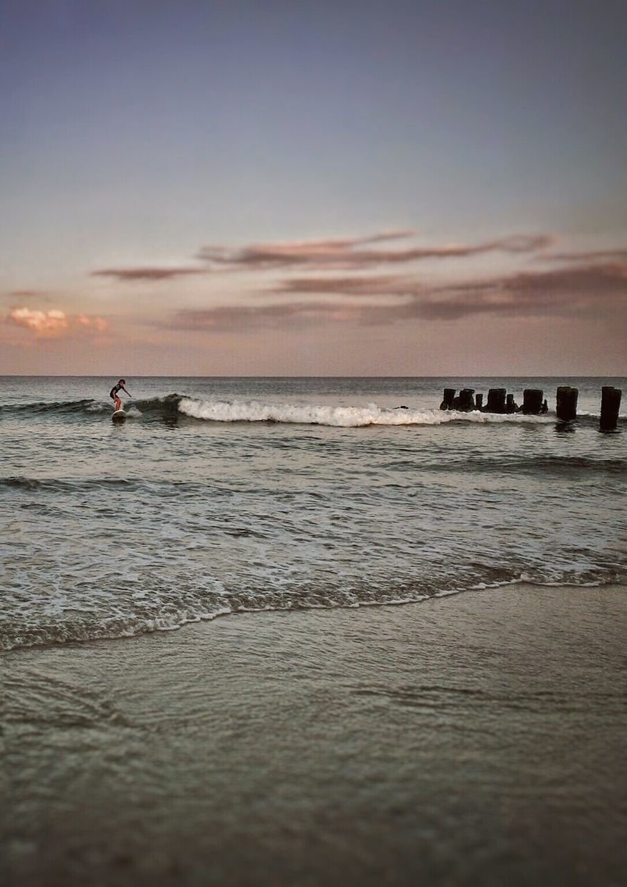 SCENIC VIEW OF SEA DURING SUNSET