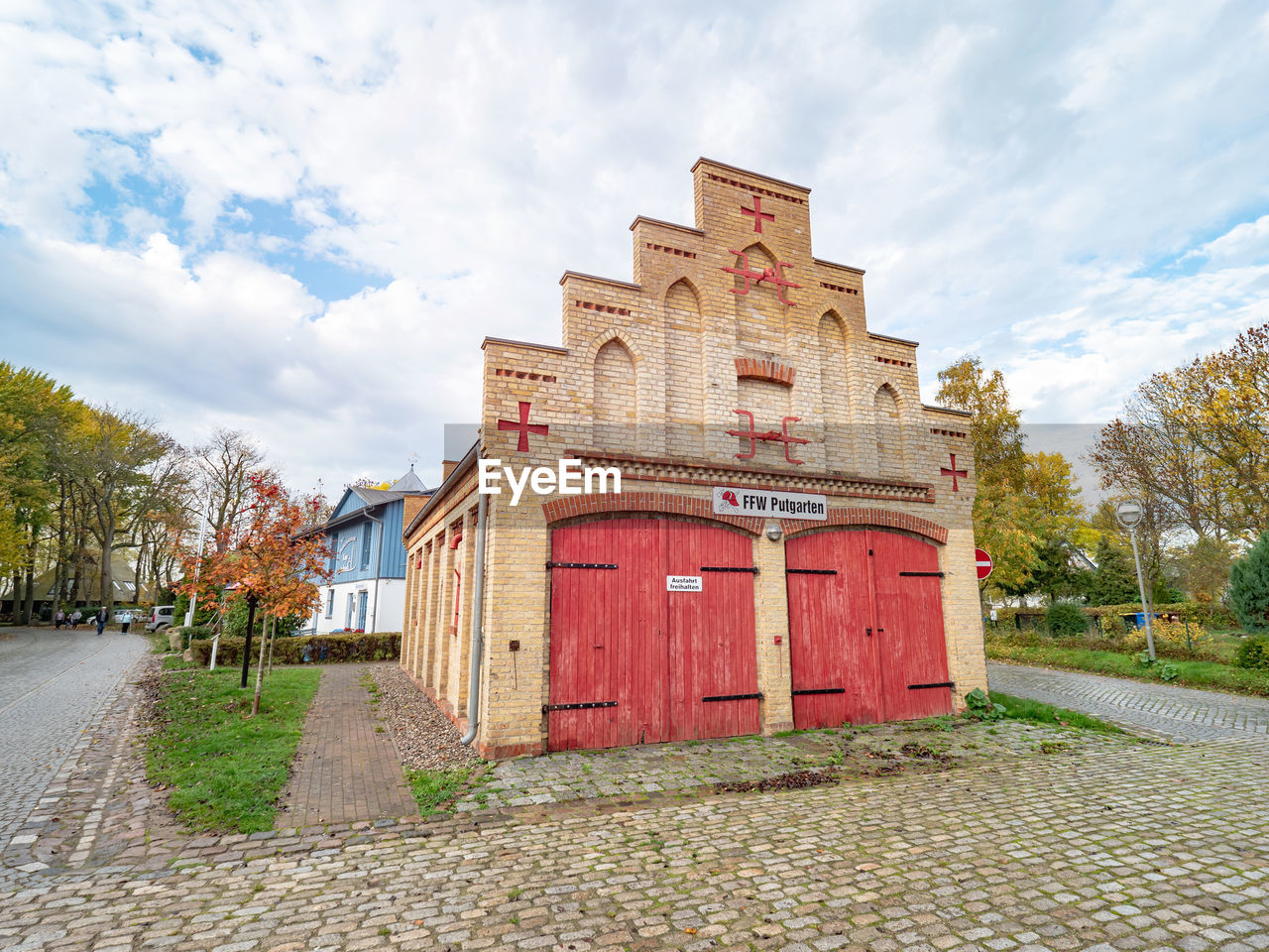 Kap arkona, historical firehouse with two gates for fire engines in old fishing village putgarten.