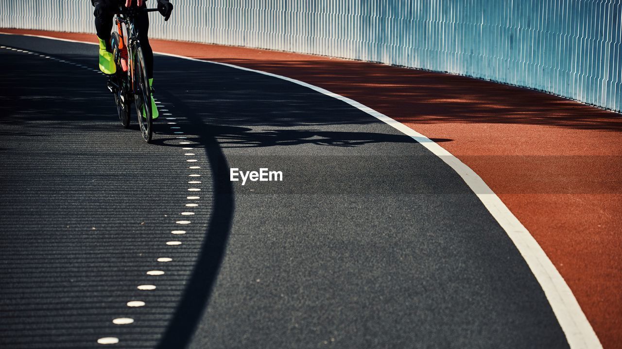 Cyclist cycling in track 