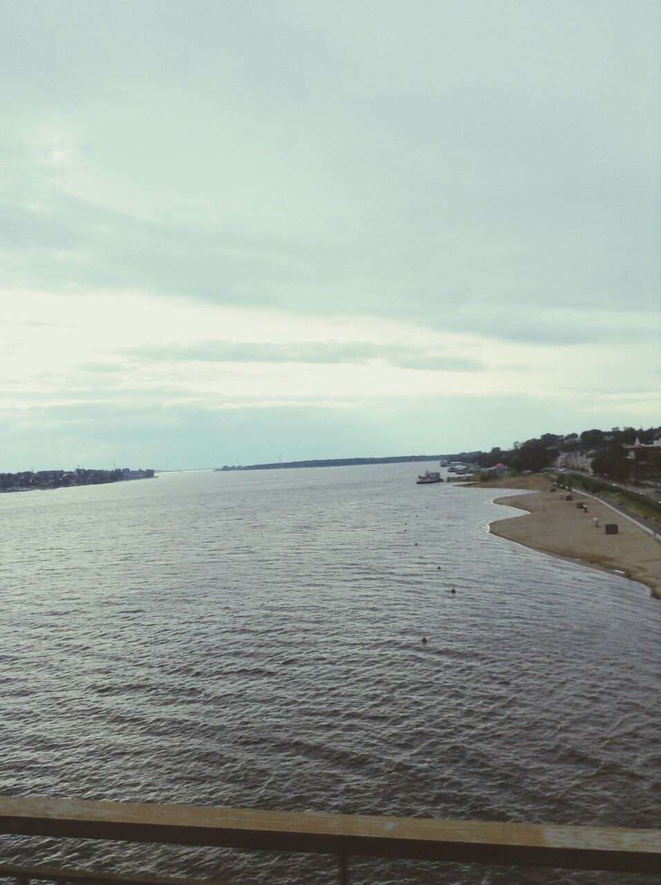 VIEW OF SEA AGAINST CLOUDY SKY