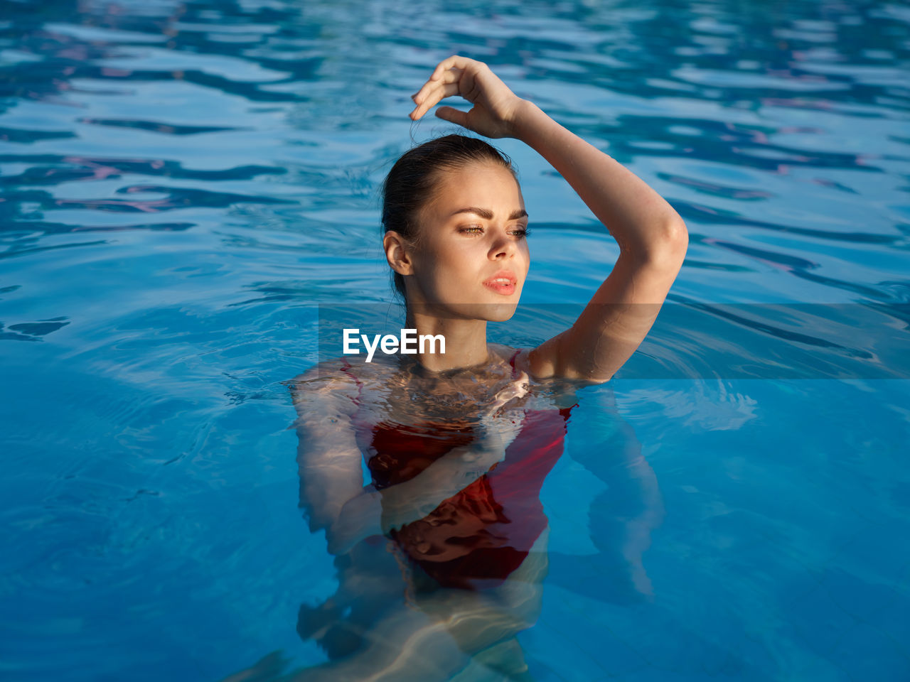 High angle view of boy swimming in pool