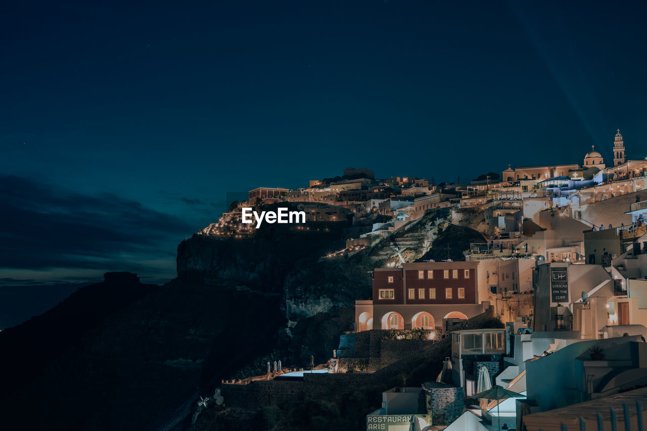 TOWNSCAPE AGAINST SKY AT NIGHT