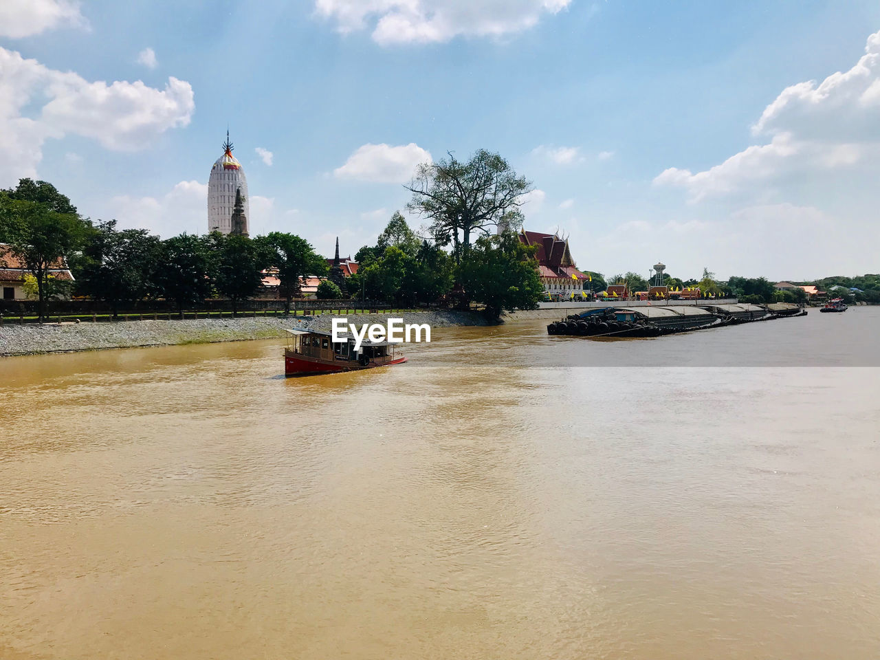 VIEW OF BOATS IN RIVER