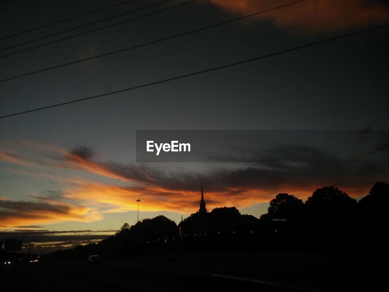 Dramatic sky over city during sunset