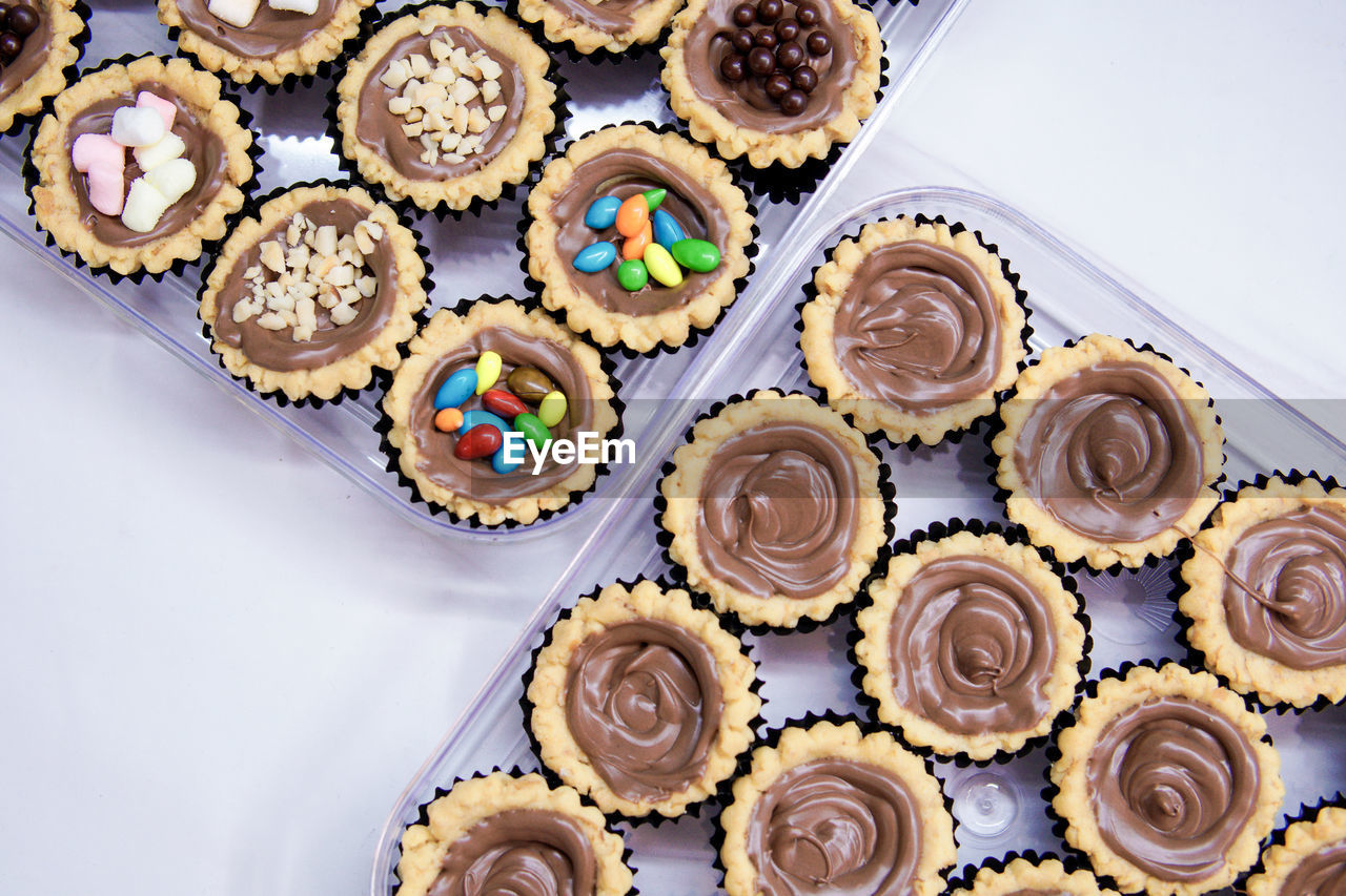 Cheese tart, chocolate tart, and various types of tarts are served to be eaten on eid.