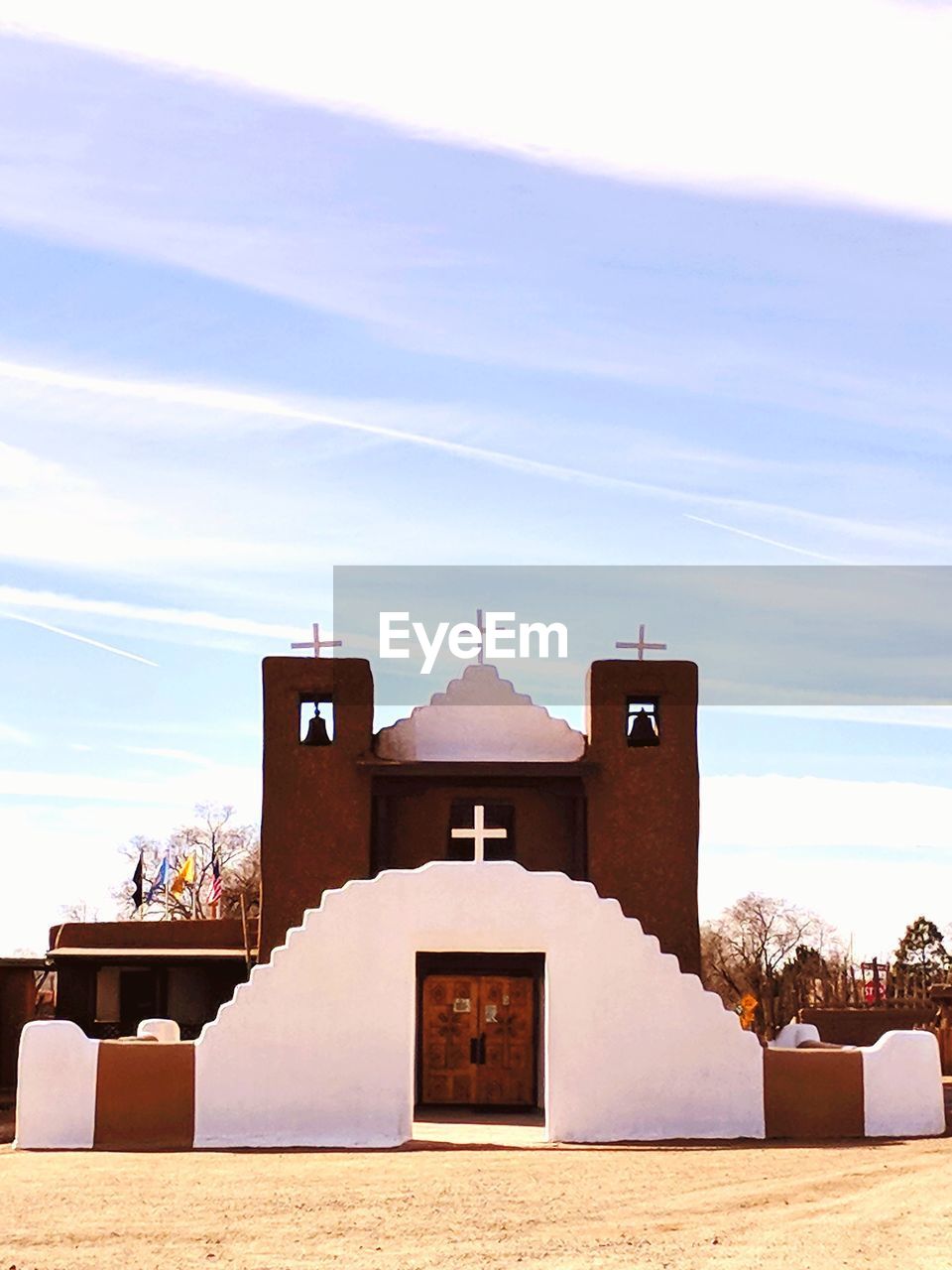 Church amidst buildings against sky