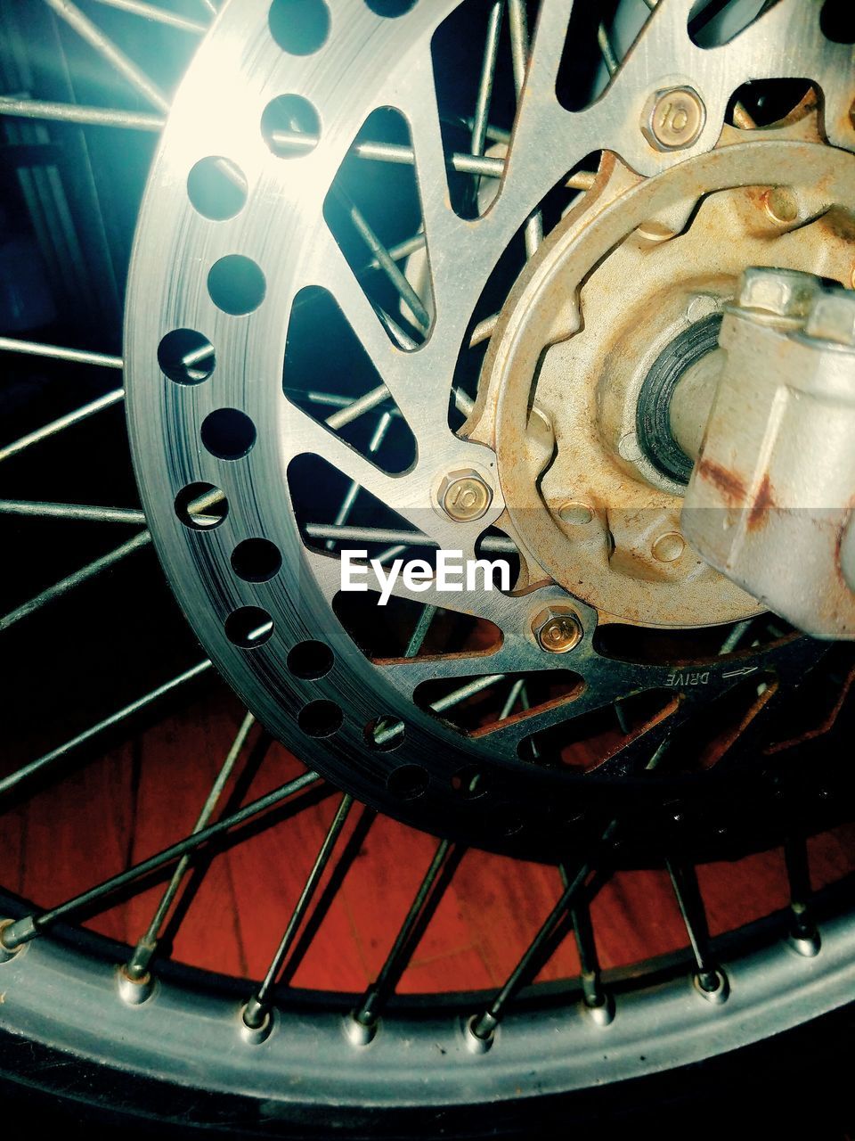wheel, gear, machinery, no people, tire, spoke, close-up, indoors, day