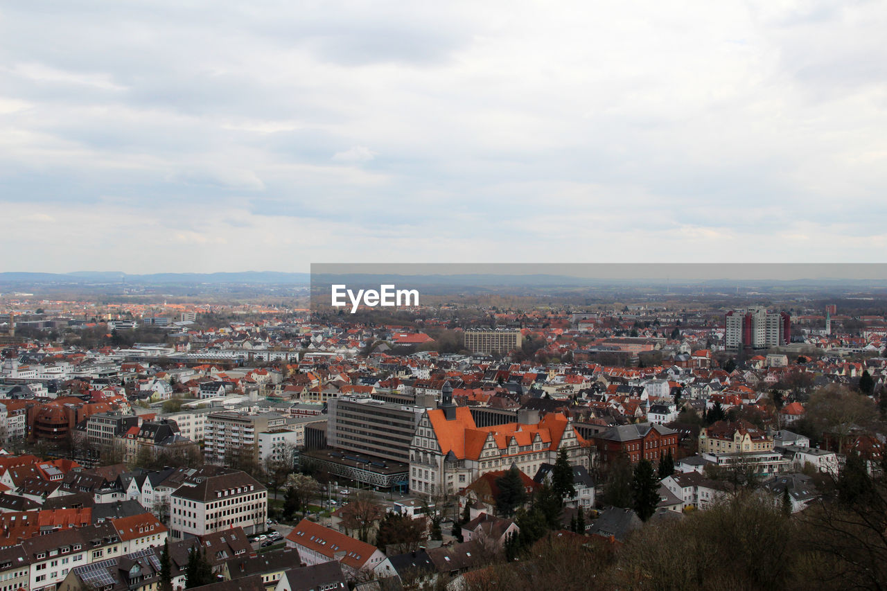 High angle shot of townscape against sky