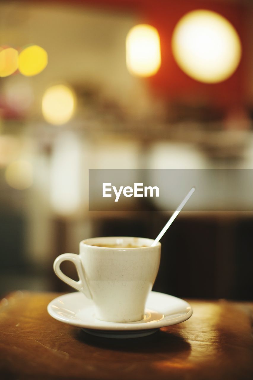 Close-up of coffee cup on table