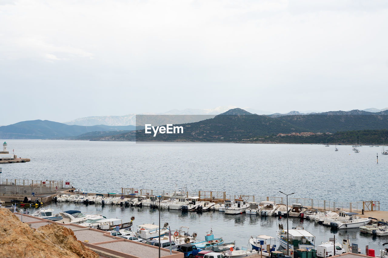 High angle view of boats moored in harbor