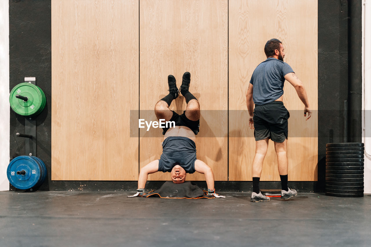 Men exercising in gym