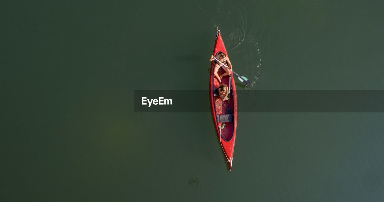 People canoeing in lake