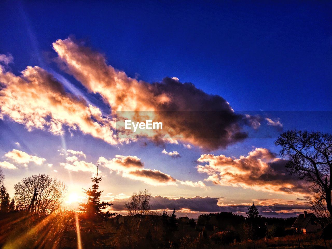 LOW ANGLE VIEW OF SILHOUETTE SKY AT SUNSET