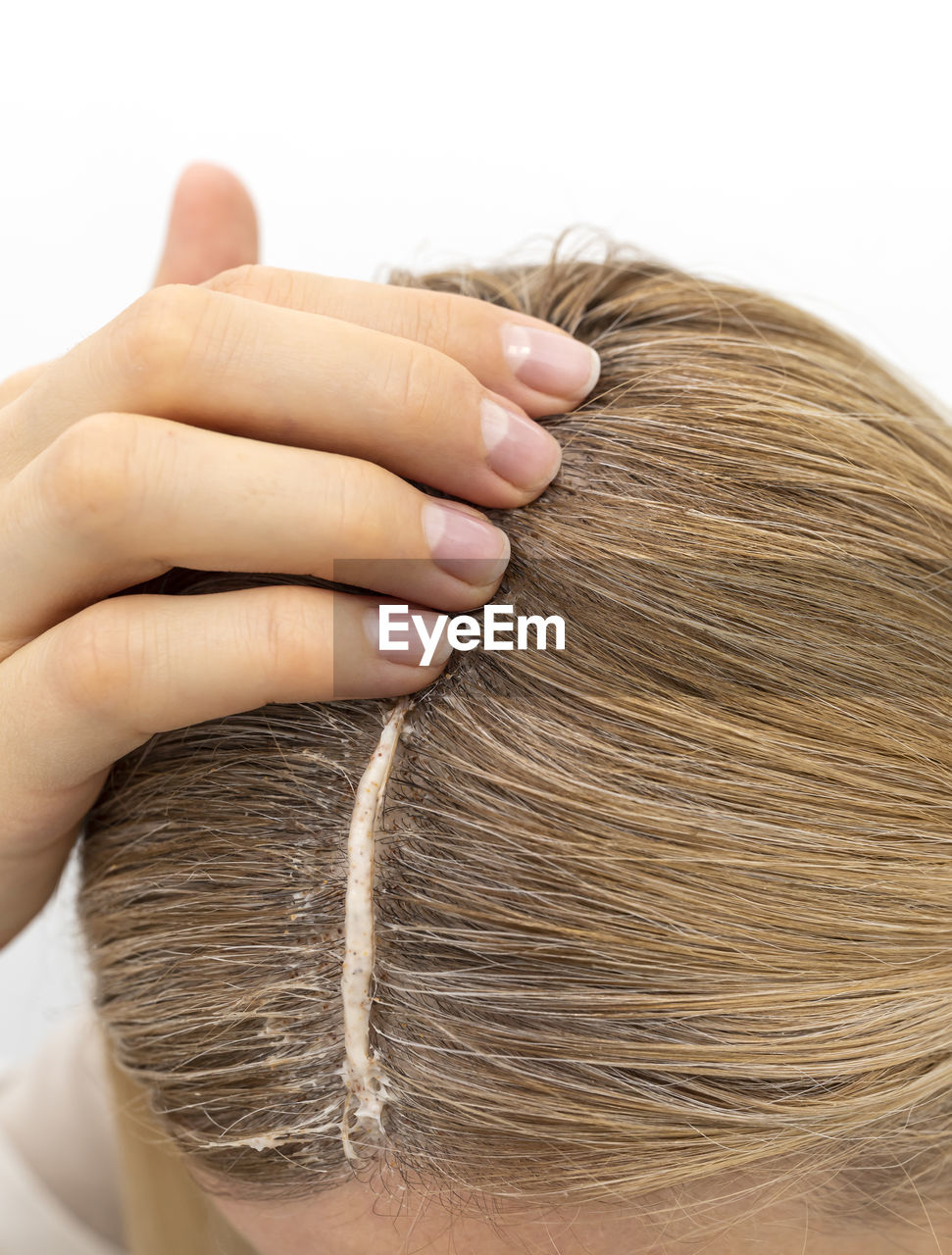 human hair, hand, adult, women, hairstyle, one person, close-up, brown, human head, indoors, young adult, studio shot, long hair, white background, eyebrow, female, bun, braid, blond hair, brown hair, headshot, portrait, french braid, beauty treatment