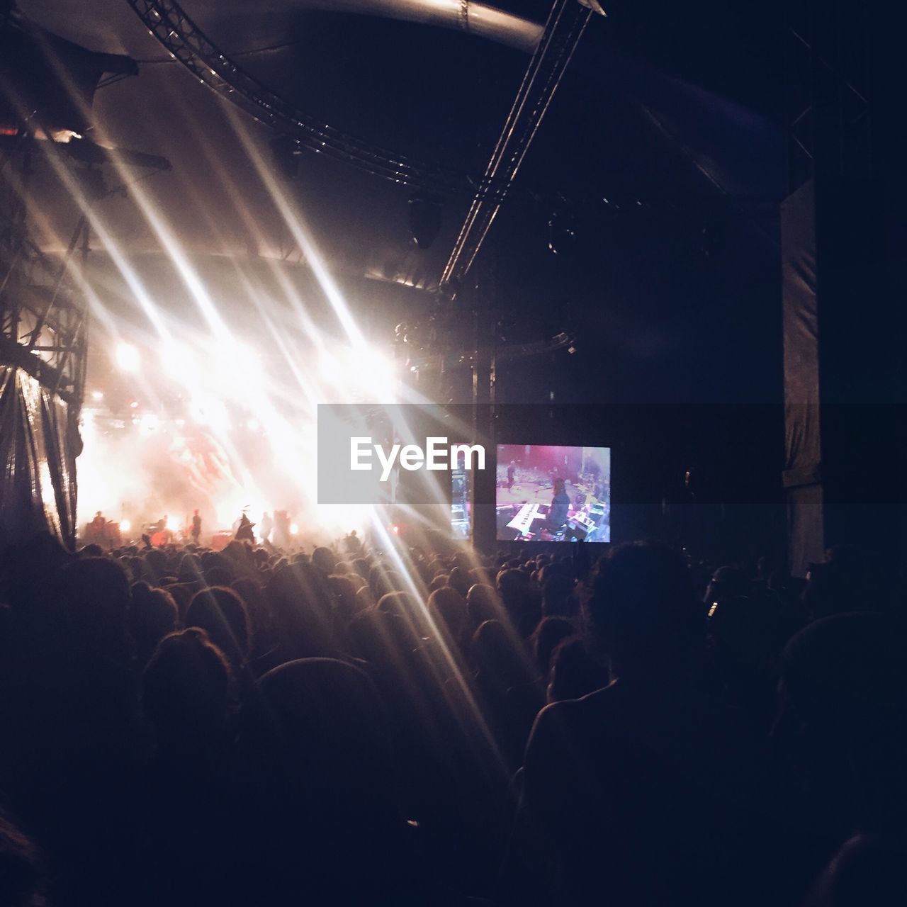 PEOPLE ENJOYING MUSIC CONCERT