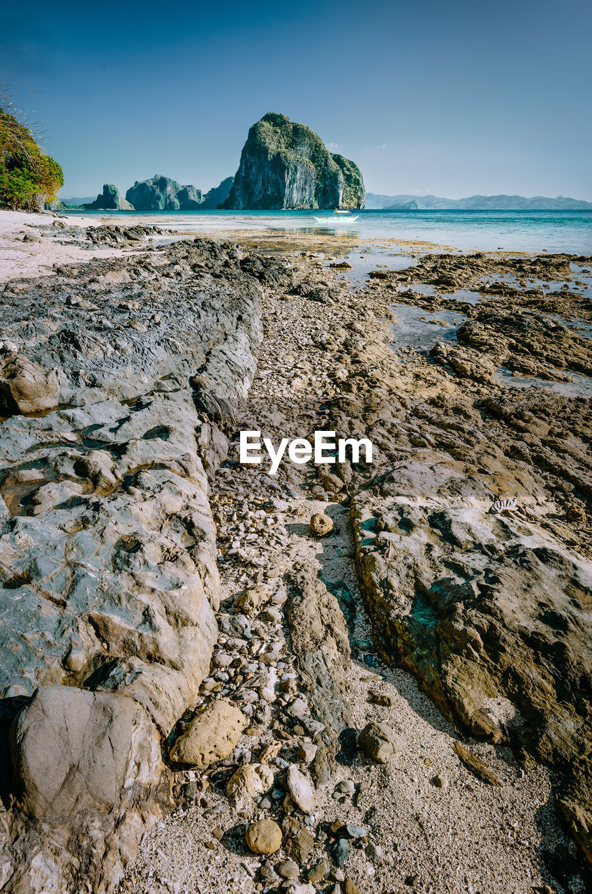 Rocks on shore at beach