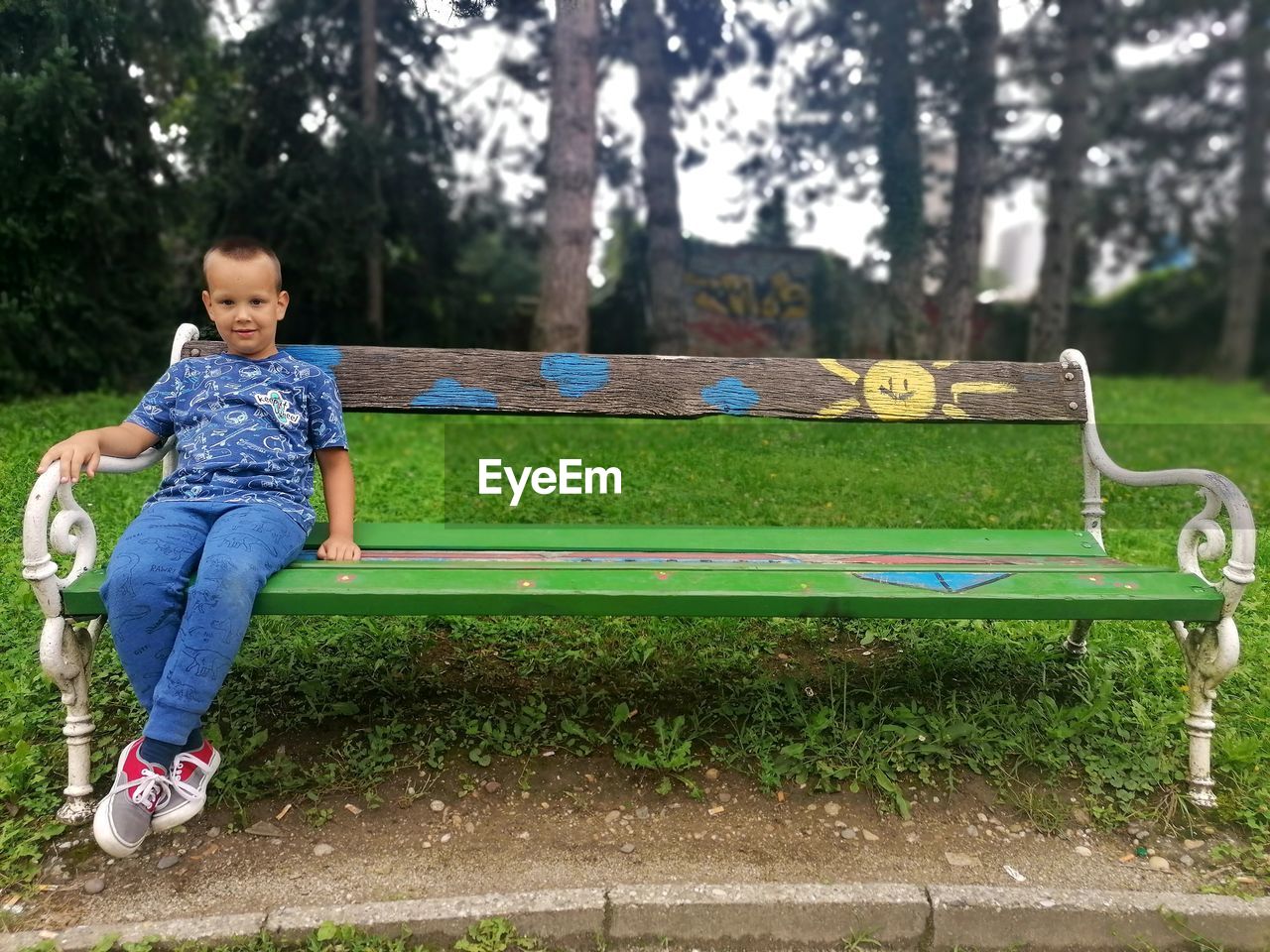 Boy on bench in park