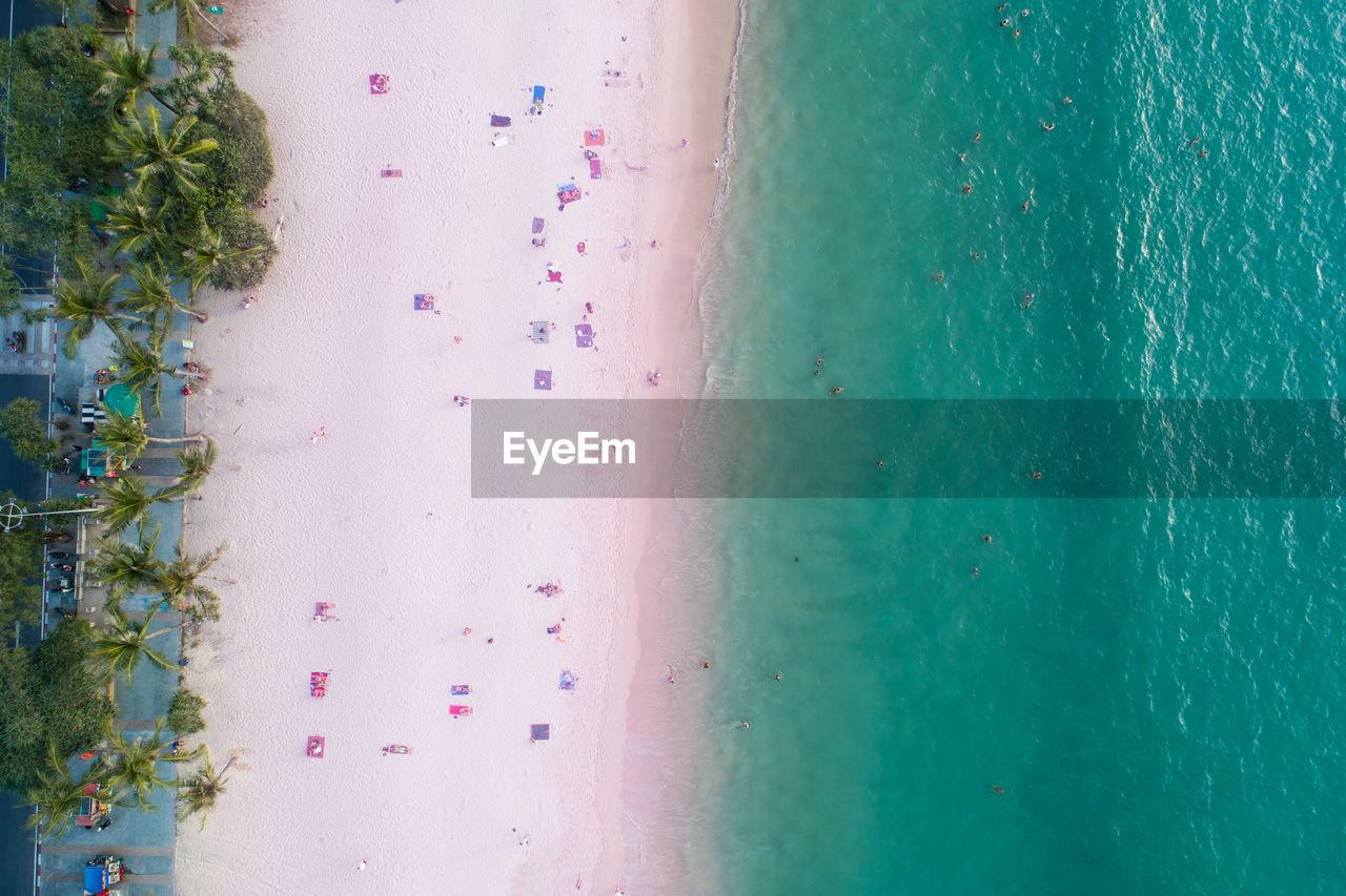 Aerial view top down of pink sandy beach beautiful pastel sand beach phuket thailand amazing sea