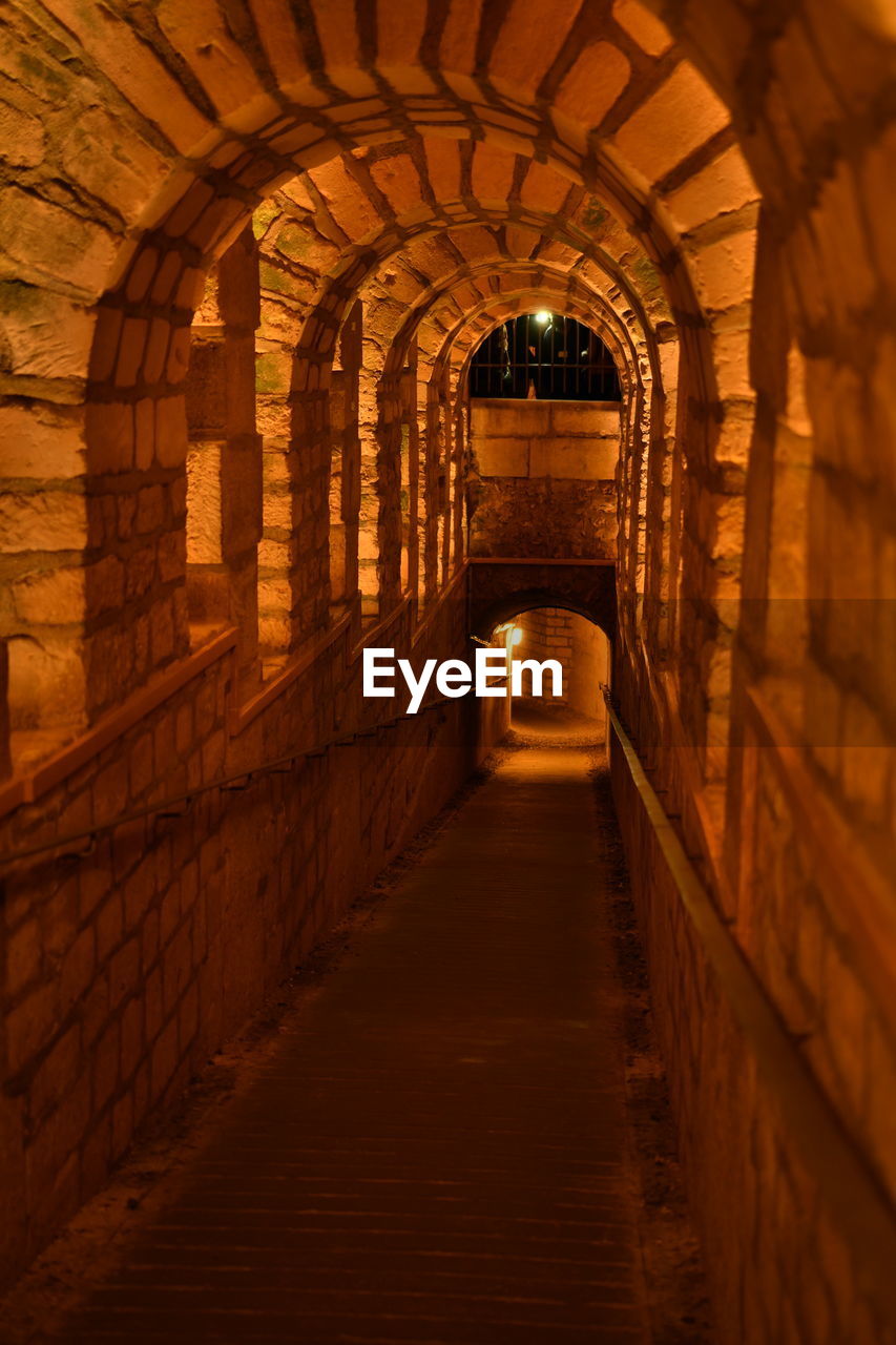 CORRIDOR IN ILLUMINATED BUILDING