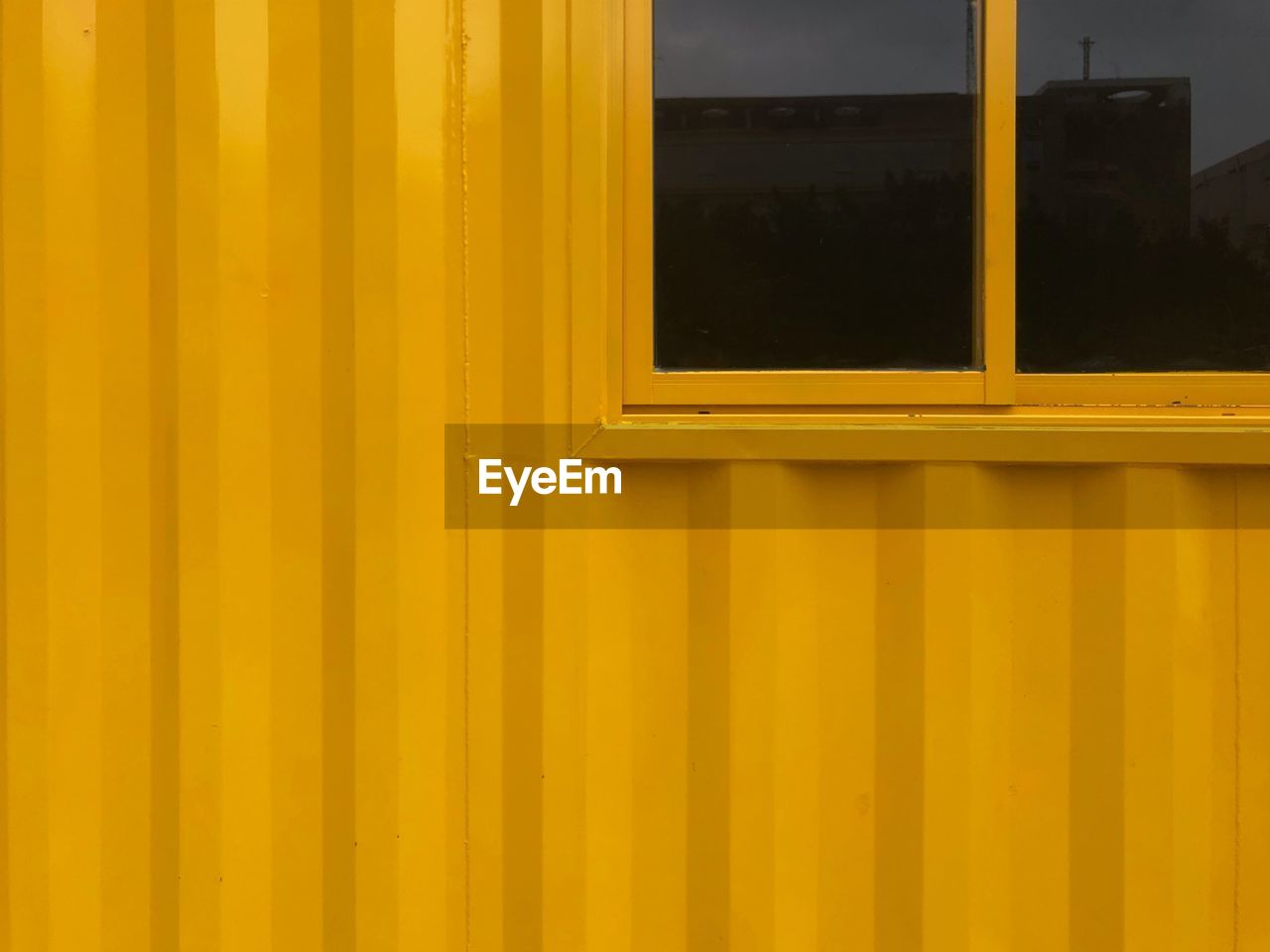 Full frame shot of yellow window on building