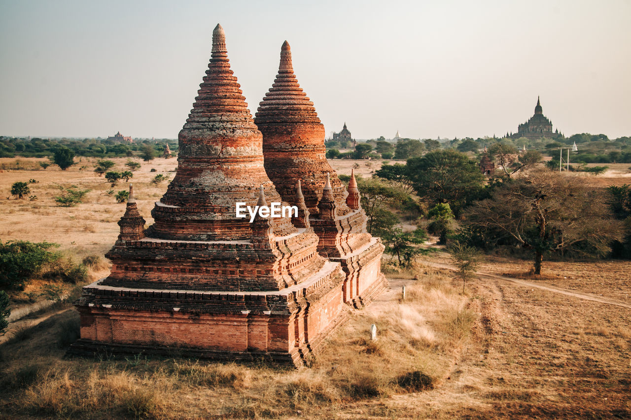 TEMPLE AGAINST BUILDING