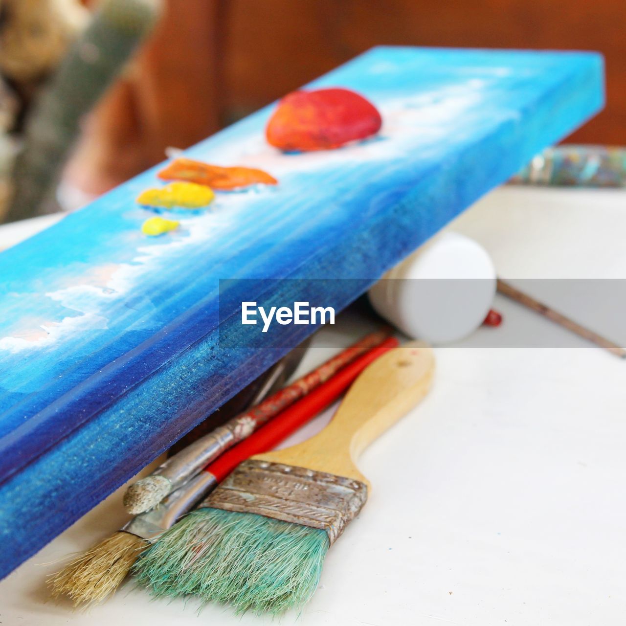 Close-up of painting tools on table