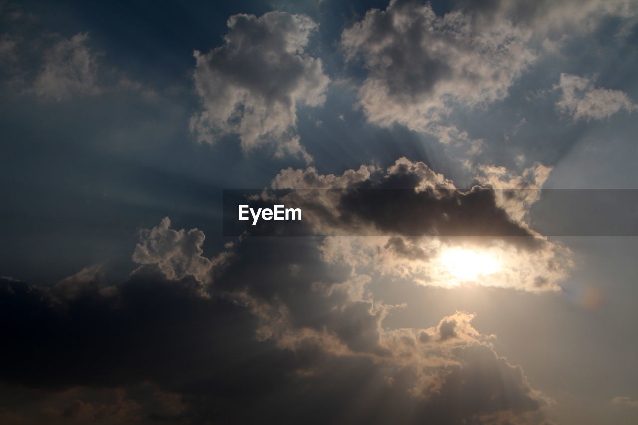 Low angle view of cloudy sky during sunset