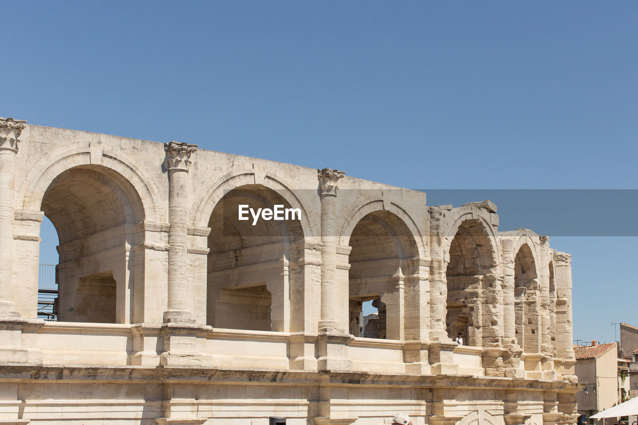 Low angle view of historic building against clear sky