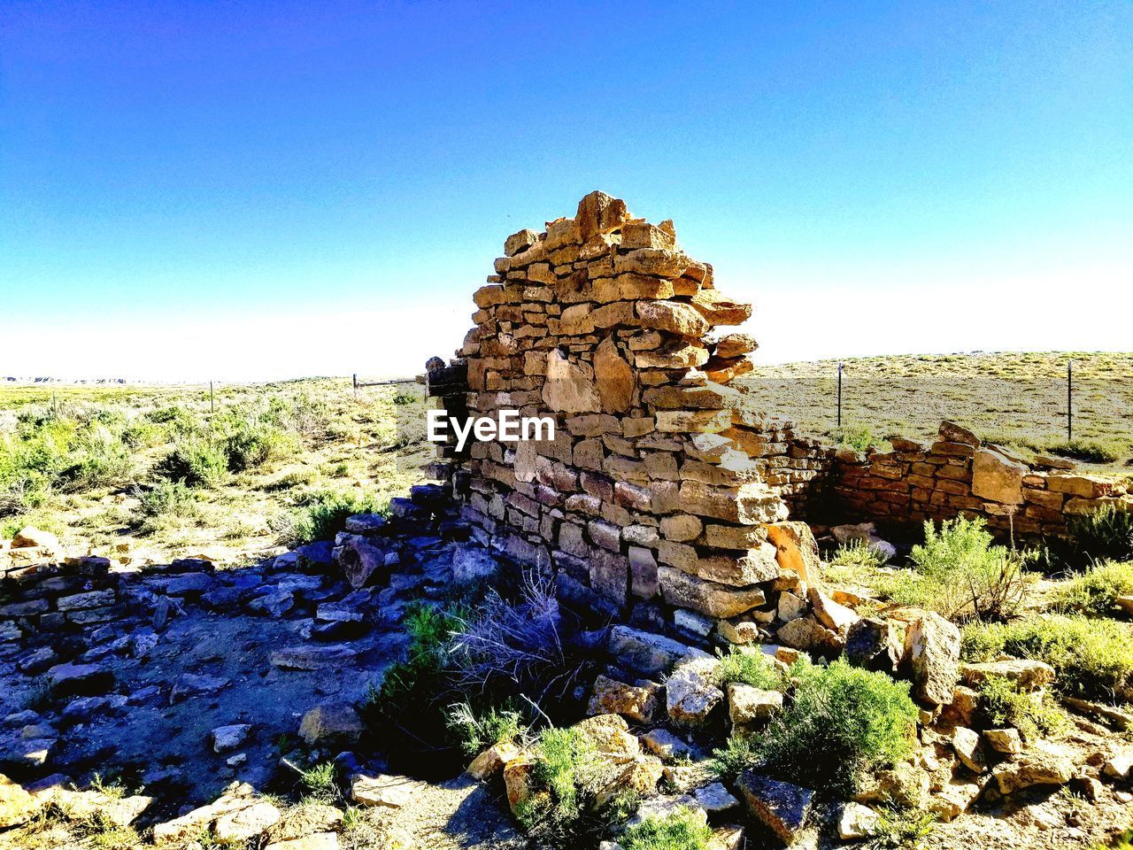 STACK OF ROCKS AGAINST BLUE SKY