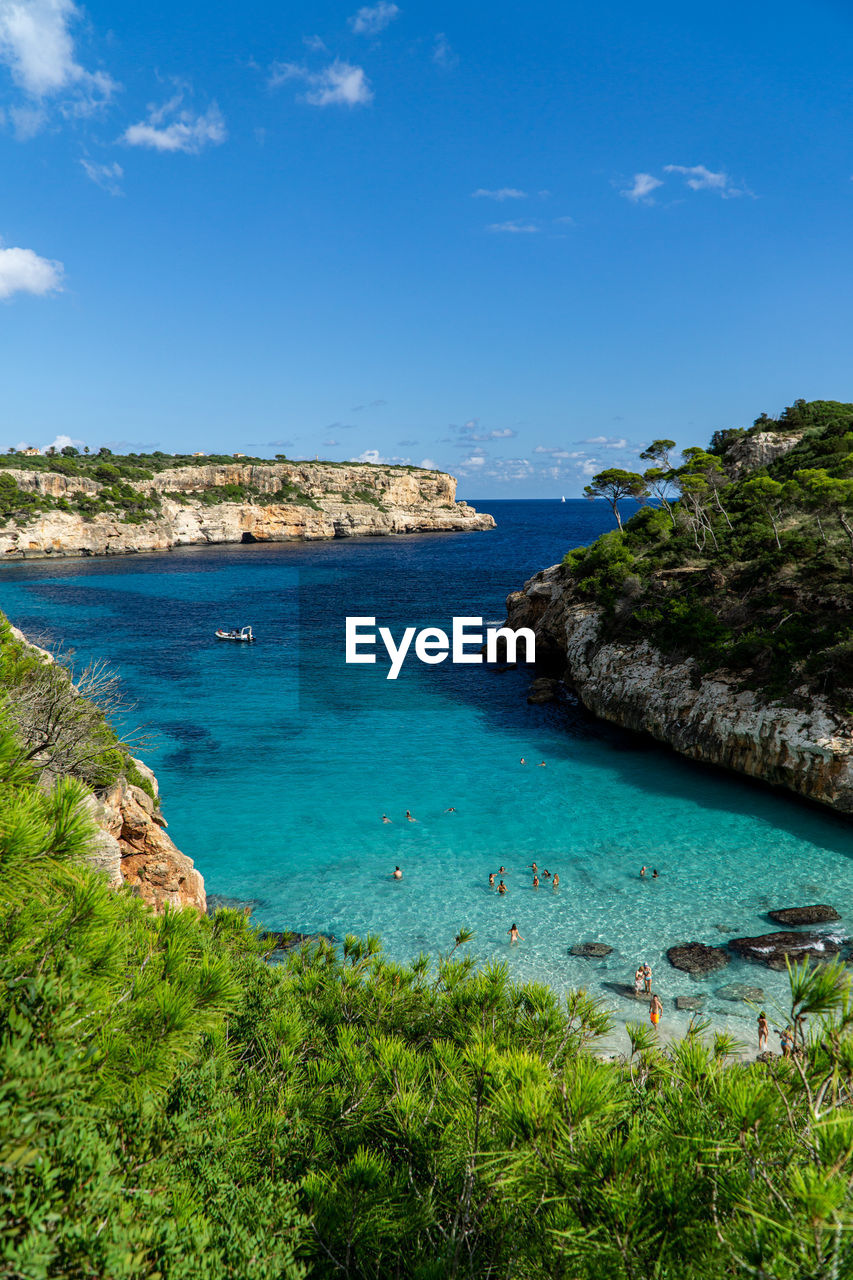 SCENIC VIEW OF BAY AGAINST SKY