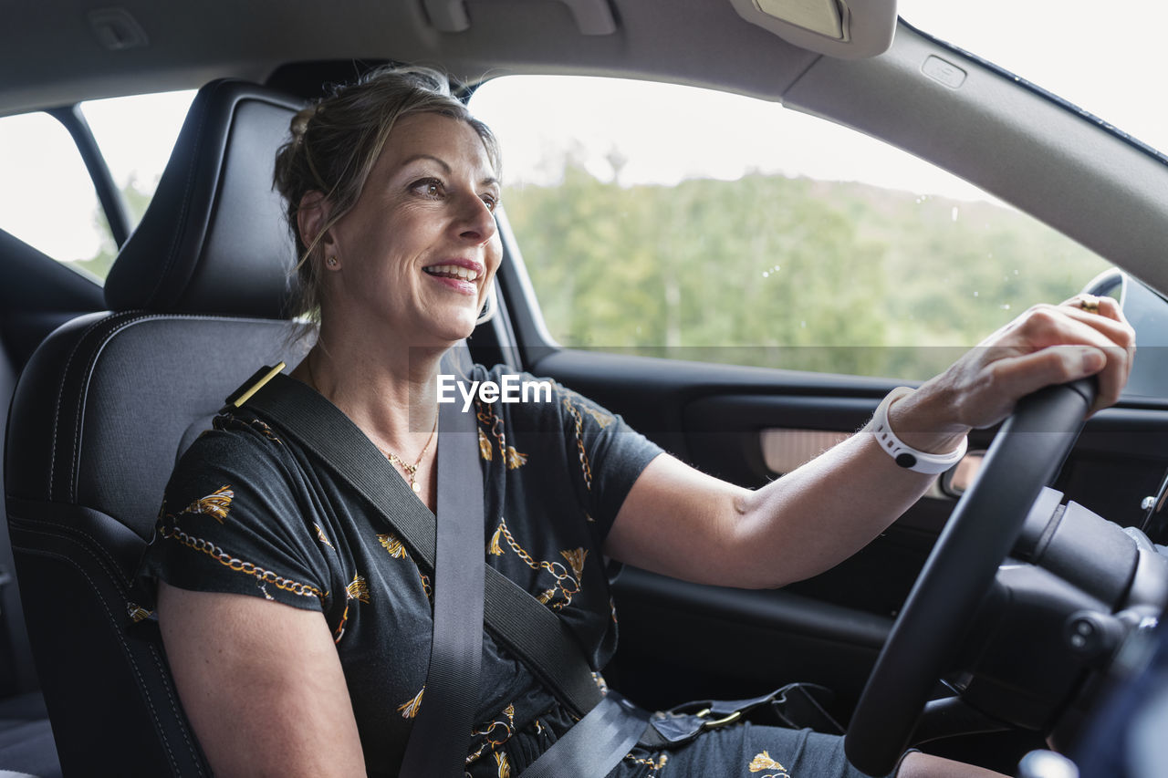 Woman driving car