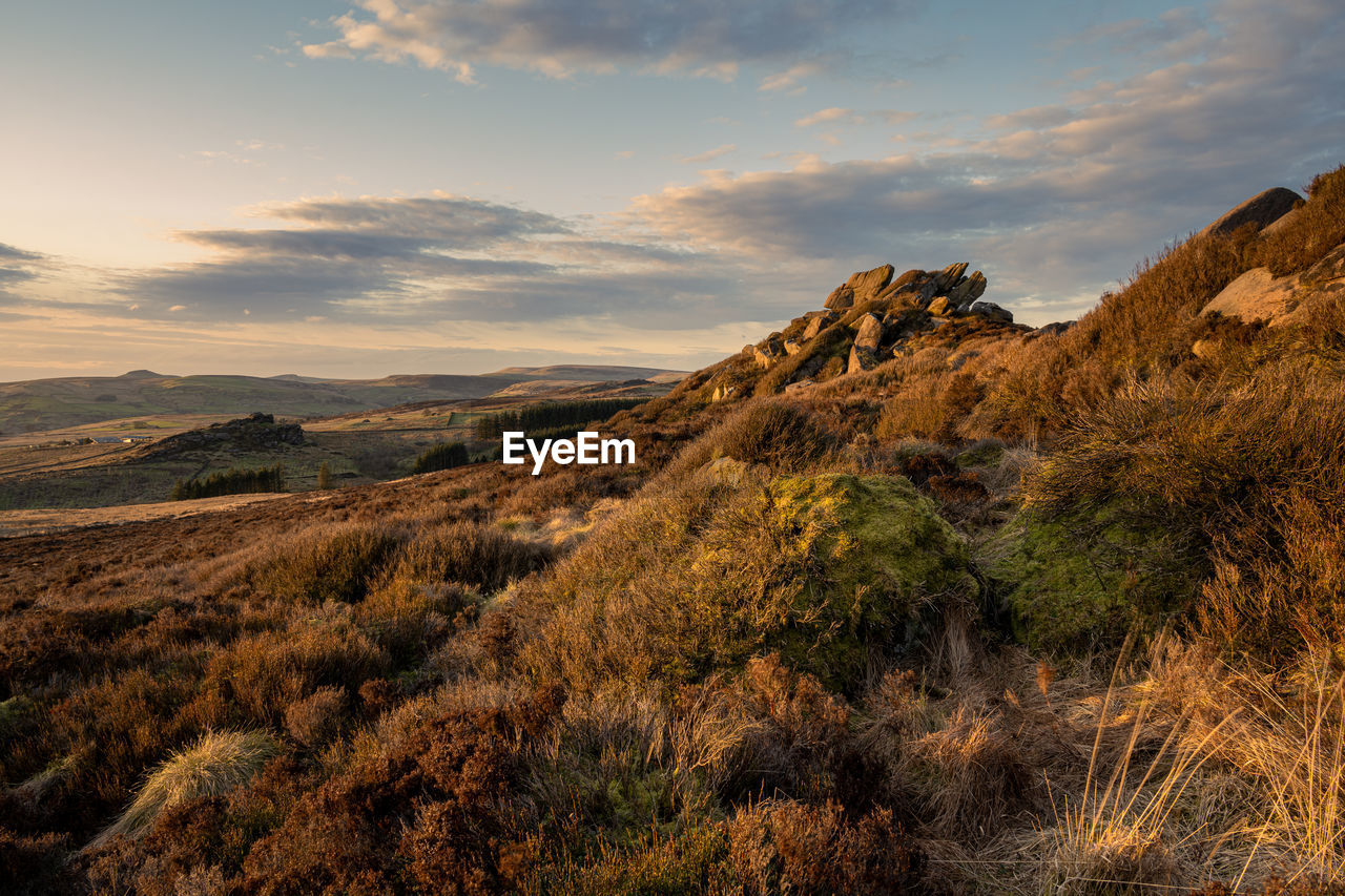 Sunset at baldstone, and gib torr. winter in the peak district national park, staffordshire, uk.