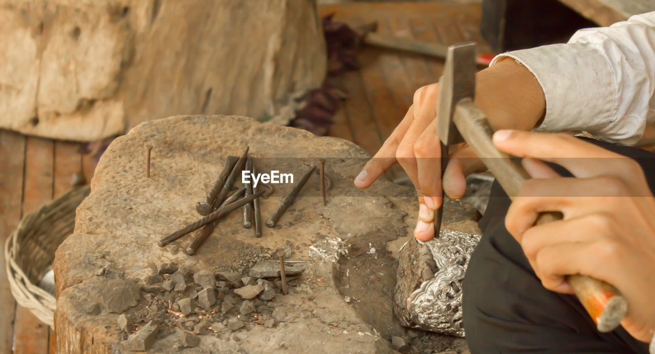 Close-up of hands working