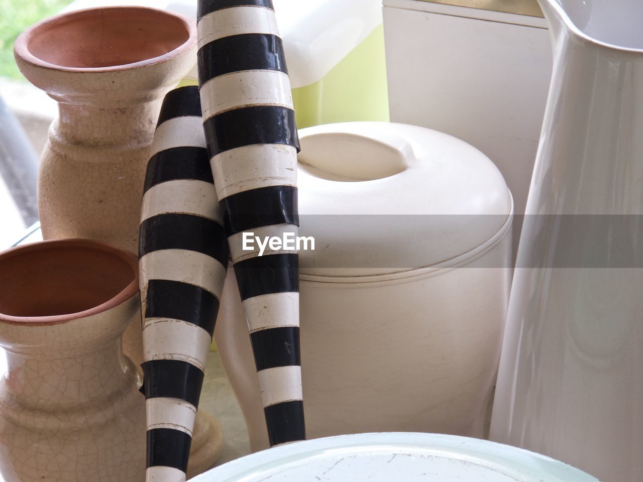 Objects used to decorate an interior of a house, canisters and other items.