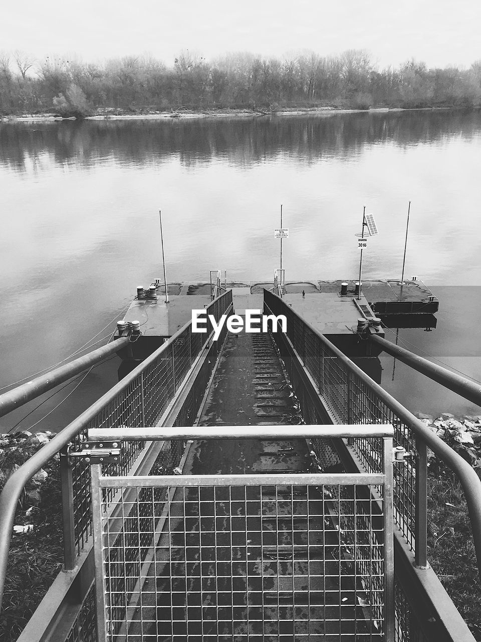 Jetty leading to calm lake