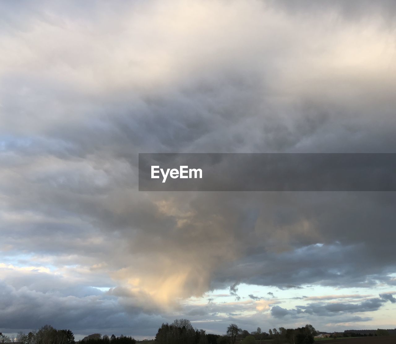 LOW ANGLE VIEW OF STORM CLOUDS OVER SKY