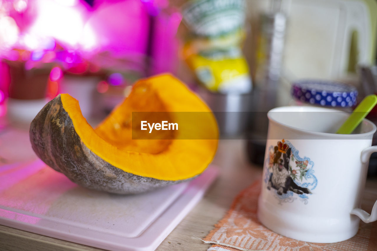 food and drink, food, cup, mug, drink, indoors, no people, crockery, meal, yellow, tableware, table, freshness, healthy eating, breakfast, refreshment, hot drink, close-up, produce, tea cup, still life, coffee cup, tea, wellbeing, focus on foreground, multi colored, flowering plant, fruit, flower, sweet food