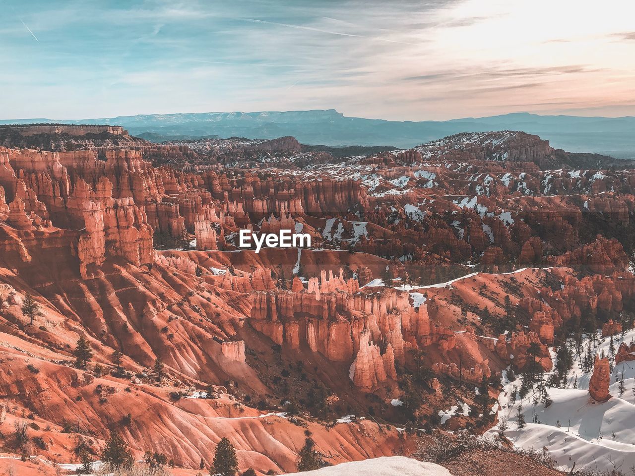 Aerial view of landscape against sky during sunset