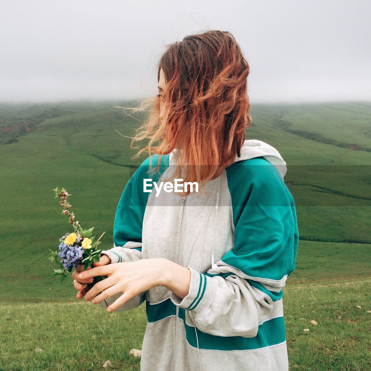 WOMAN ON FIELD