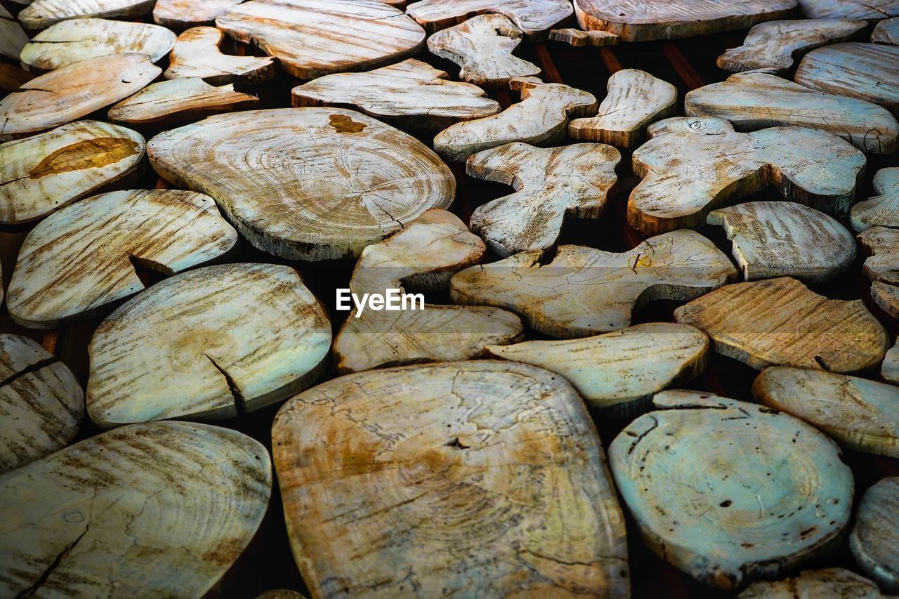 large group of objects, abundance, full frame, wood, backgrounds, food, no people, rock, day, produce, nature, textured, tree, outdoors, timber, close-up, log, lumber industry, food and drink, forest, heap, still life