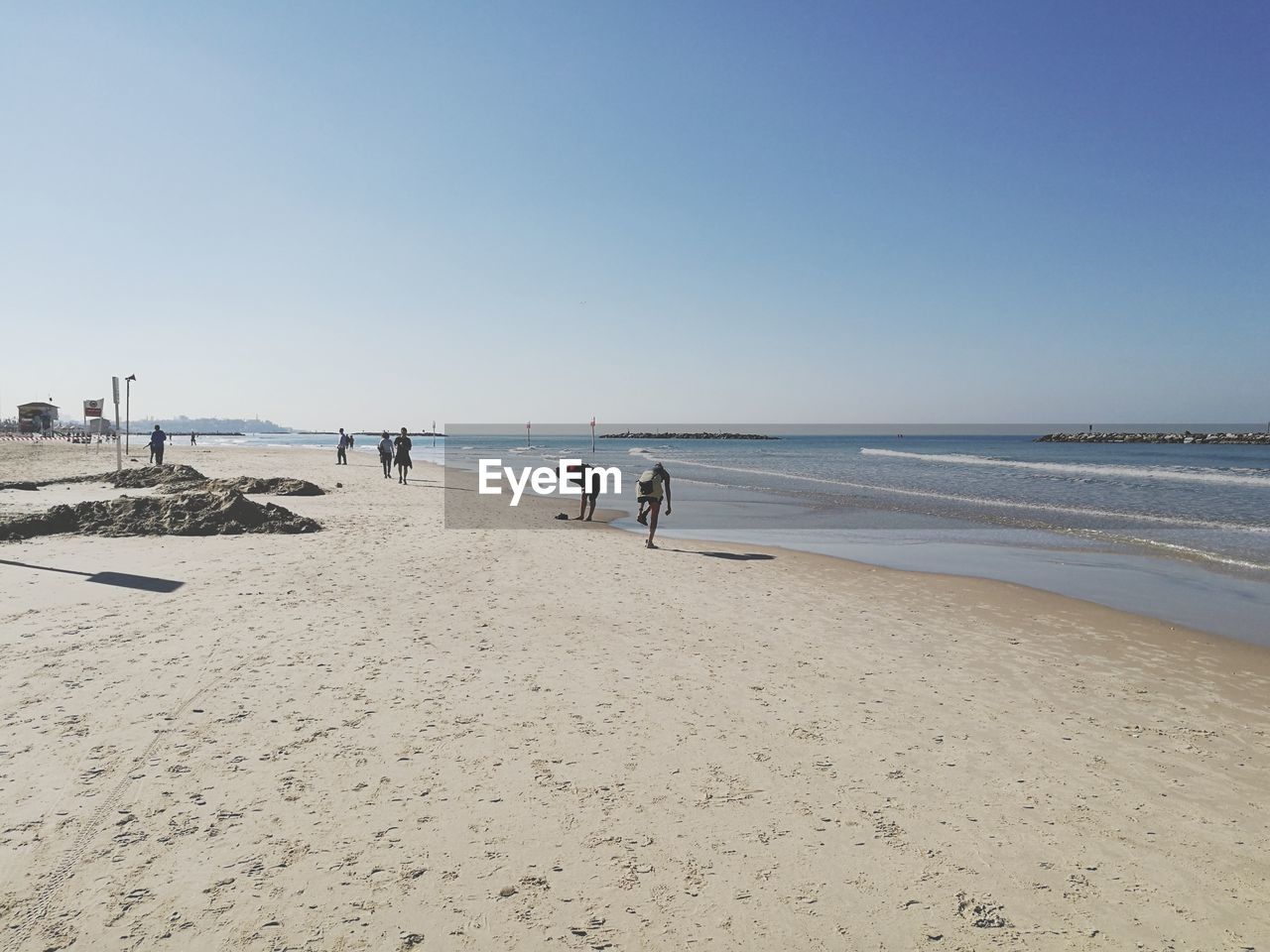 VIEW OF BEACH AGAINST CLEAR SKY