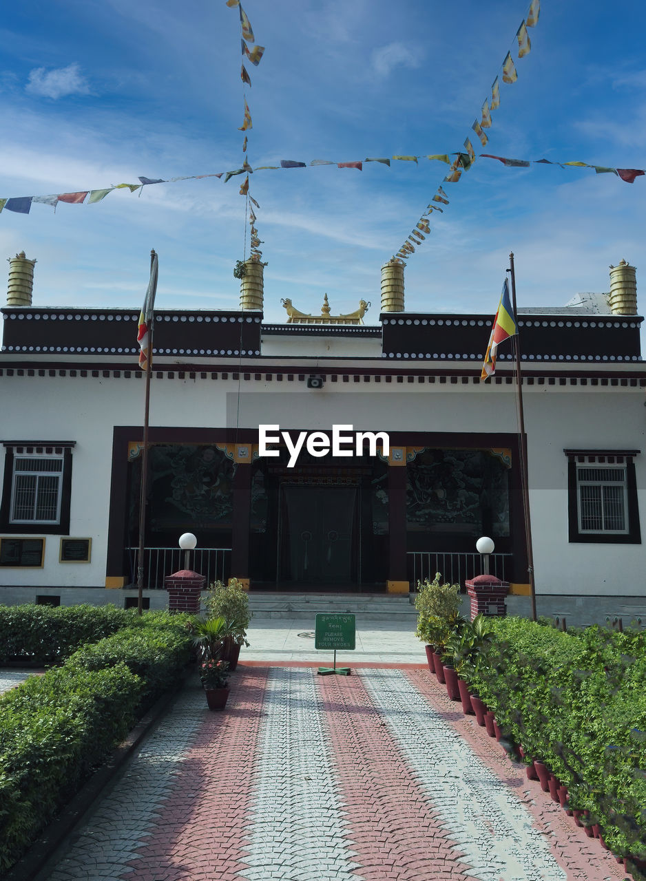 VIEW OF TEMPLE AGAINST BUILDING