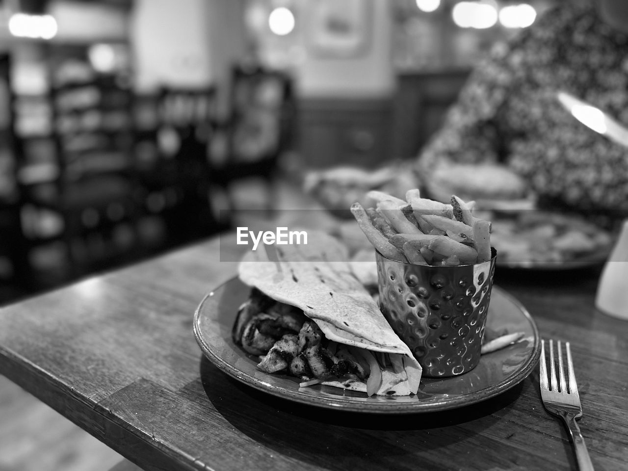 food and drink, food, black, fast food, black and white, monochrome, freshness, burrito, plate, table, focus on foreground, monochrome photography, white, taco, no people, indoors, business, meal, restaurant, healthy eating, eating utensil, kitchen utensil, wellbeing, cafe