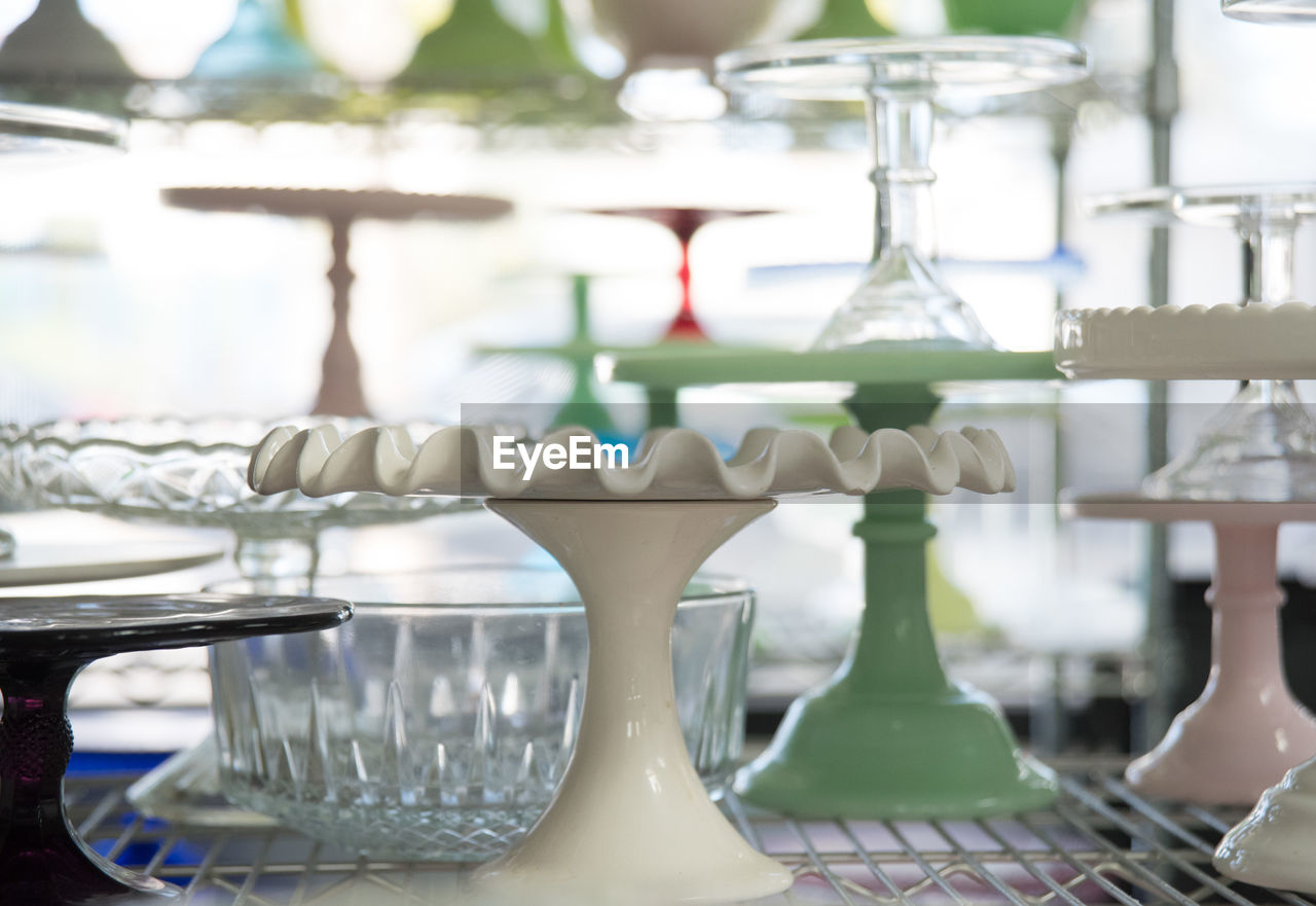 CLOSE-UP OF EMPTY GLASS ON TABLE