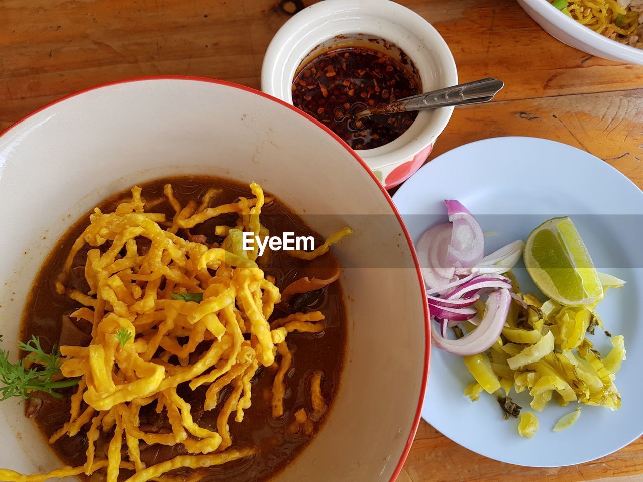 High angle view of meal served on wooden table