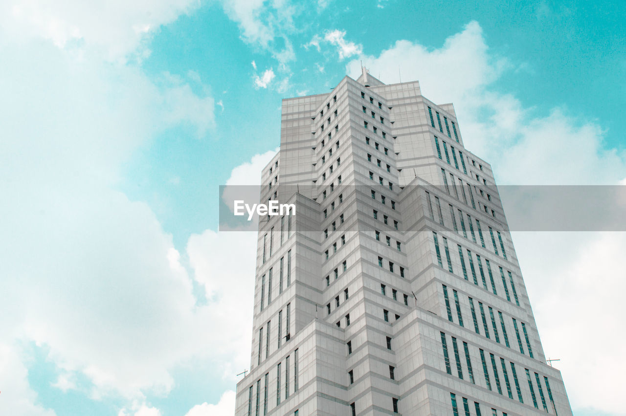 Low angle view of skyscraper against sky