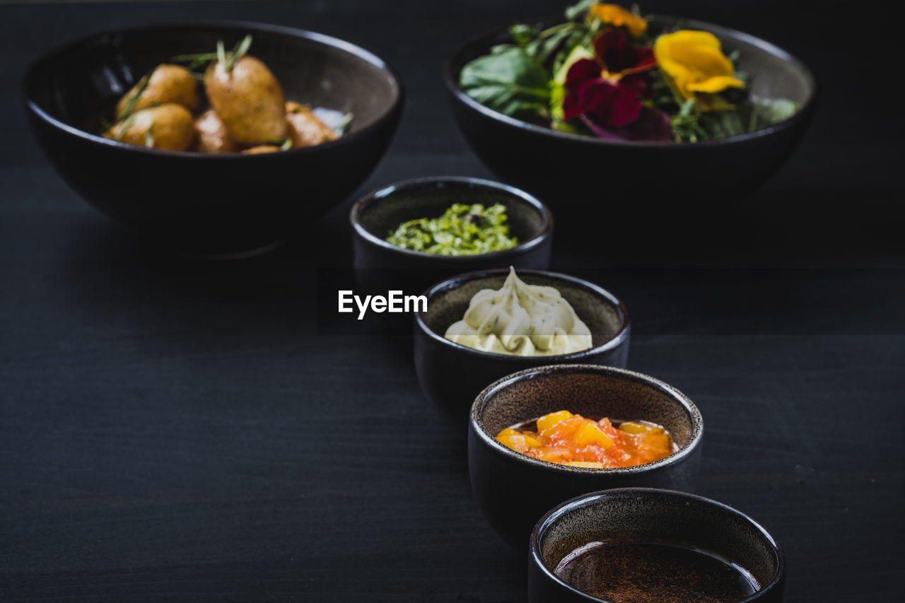 CLOSE-UP OF FOOD ON TABLE